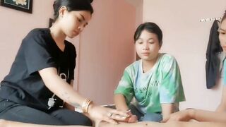 Three Thai girls practicing Handjobs while watching a film