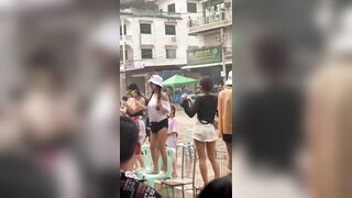 Dancing With Breasts Exposed During Songkran Festival