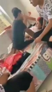 Chinese girl crying in pain as she is pushed by a friend who is trying to stuff her penis